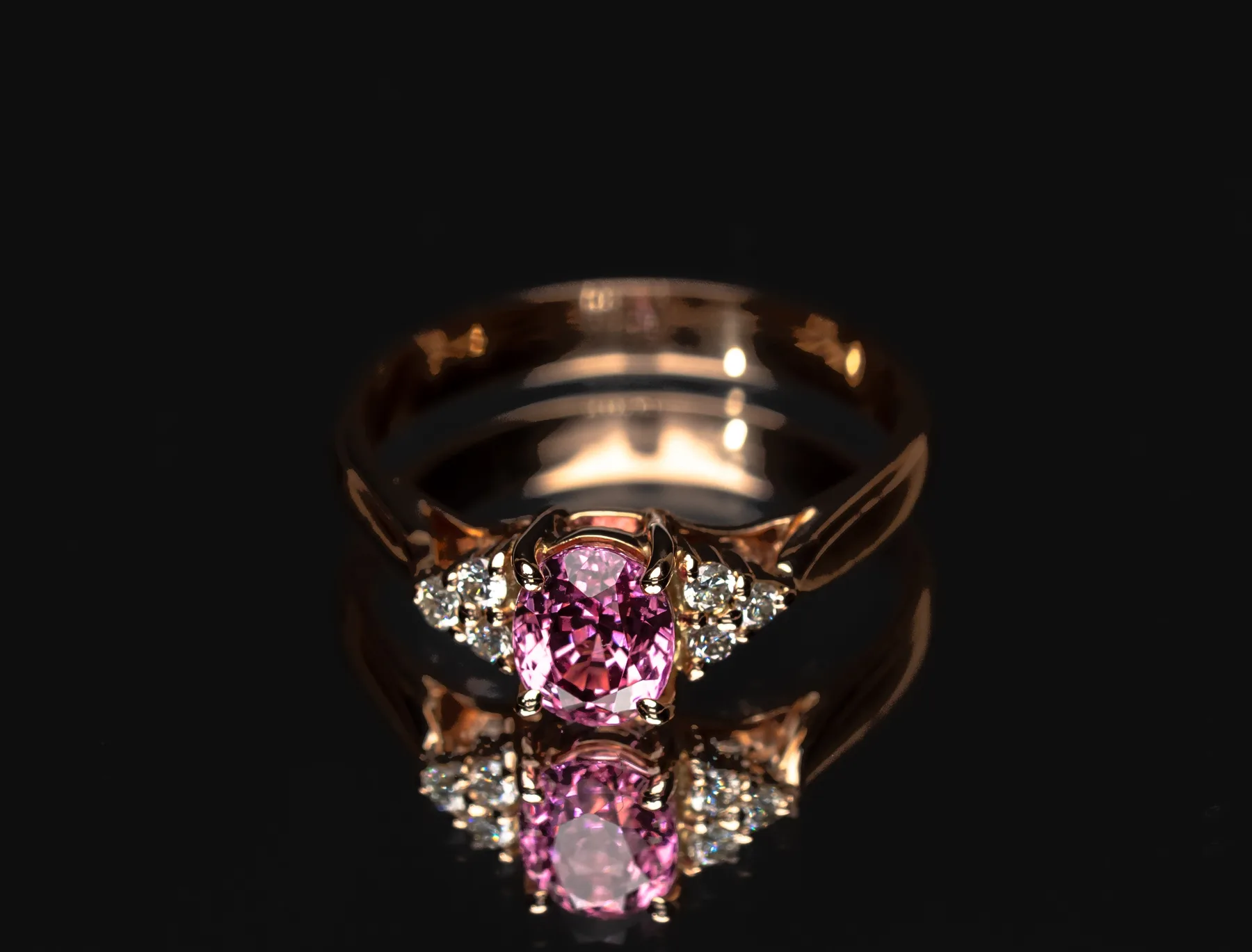 Pink gemstone diamond halo ring handcrafted by Zora Jewellers Sri Lanka