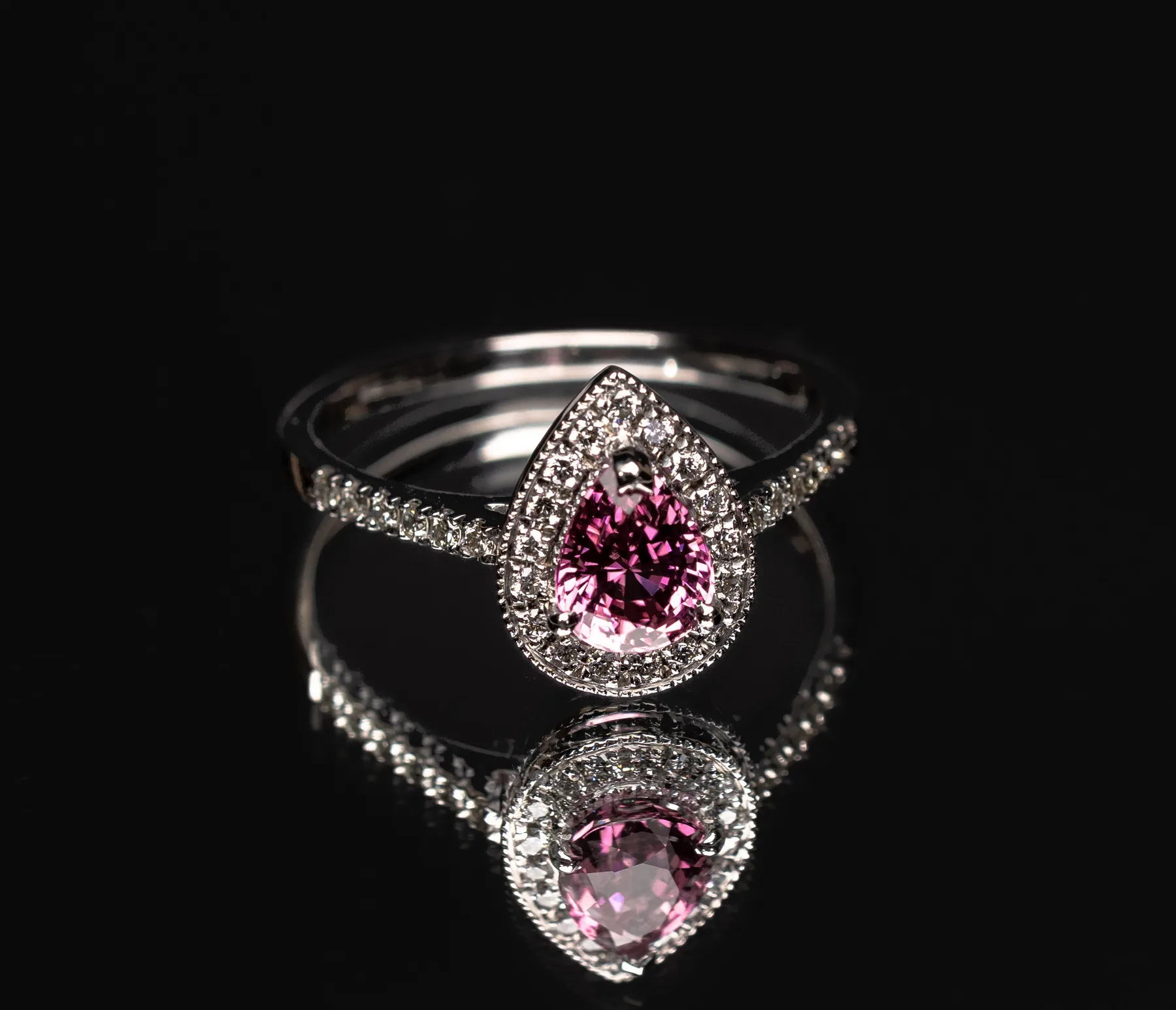 Pink gemstone diamond halo ring handcrafted by Zora Jewellers Sri Lanka